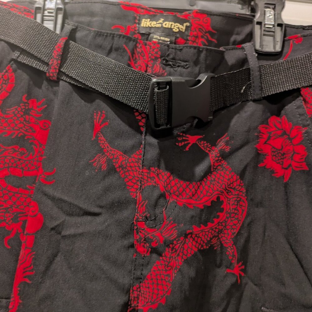 Like an Angel pants with a red and black dragon print